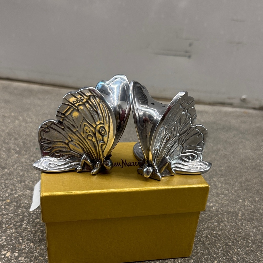 Silver  Butterfly salt and pepper shakers.